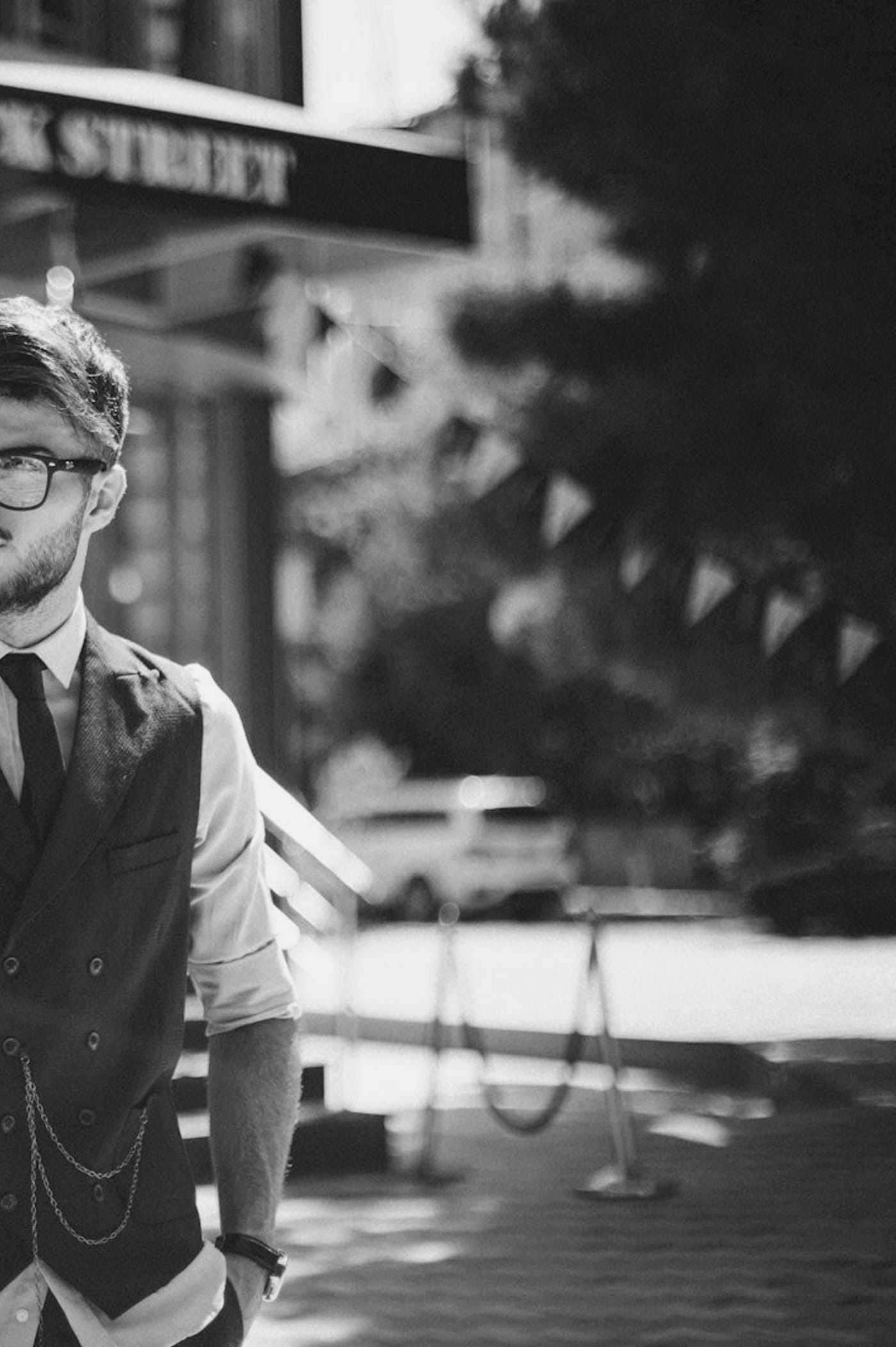 A man in a tailored waistcoat, photographed on the street